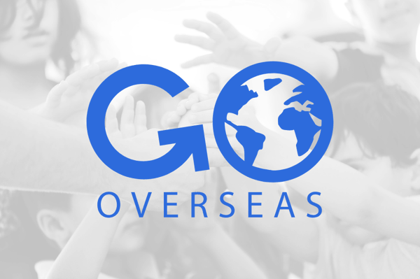 Go Overseas logo over a black and white photo of children putting their hands together